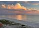 Scenic beach view featuring a beautiful sunset with fluffy clouds at 880 Mandalay Ave # S514, Clearwater Beach, FL 33767