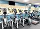 Well-equipped gym with treadmills, elliptical machines, and large windows, promoting an active lifestyle at 880 Mandalay Ave # S514, Clearwater Beach, FL 33767