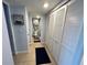 Hallway featuring closet and full bathroom at 880 Mandalay Ave # S514, Clearwater Beach, FL 33767