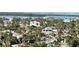 Residential street with palm trees and diverse homes offers a scenic, waterfront community at 880 Mandalay Ave # S514, Clearwater Beach, FL 33767