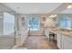 Bright and airy bathroom with a soaking tub, walk-in shower, and double vanity at 9314 Heritage Oak Ct, Tampa, FL 33647