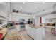 Well-lit kitchen featuring granite countertops, stainless steel appliances, ample cabinet space, and center island at 9314 Heritage Oak Ct, Tampa, FL 33647