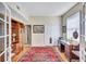 Office features built-in shelves, a desk, and a window with natural light at 9314 Heritage Oak Ct, Tampa, FL 33647