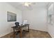 Office featuring a desk, computer, chair, and window to let the light in at 1018 Rose Blossom Ct, Tampa, FL 33613