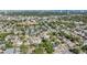 Expansive aerial view of a residential neighborhood, showing the layout and proximity to local amenities at 1104 S Lois Ave, Tampa, FL 33629