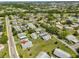 Residential neighborhood featuring single-story homes and lush greenery at 124 Gloucester Blvd # 355J, Sun City Center, FL 33573