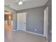 Spacious living room with tile flooring and open access to adjacent rooms at 124 Gloucester Blvd # 355J, Sun City Center, FL 33573