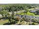 Charming townhomes with lush landscaping and mature trees in a well-maintained community at 1333 Shady Pine Way # B, Tarpon Springs, FL 34688