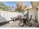 Back patio with seating, privacy fence, and a lovely outdoor space for entertaining or relaxing at 1333 Shady Pine Way # B, Tarpon Springs, FL 34688