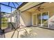 Enjoy this screened-in patio with ceiling fan that walks out to the manicured backyard at 13611 Circa Crossing Dr, Lithia, FL 33547