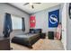 Bedroom with carpet, ceiling fan, gray walls, and a window with blinds and curtains at 14885 Caravan Ave, Odessa, FL 33556