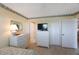 Cozy bedroom with neutral decor, ample storage, and a well-lit atmosphere at 19701 Gulf Blvd # 231, Indian Shores, FL 33785