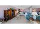 Spacious living room with comfortable seating, a ceiling fan, and seamless flow to the dining area at 19701 Gulf Blvd # 231, Indian Shores, FL 33785