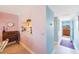 Open-concept condo with kitchen looking into the living room and a peek at the gorgeous outdoor views at 19701 Gulf Blvd # 231, Indian Shores, FL 33785