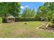 Expansive backyard featuring a gazebo and lush greenery at 20315 Mid Ct, Lutz, FL 33558