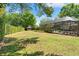Expansive backyard featuring a gazebo and lush greenery at 20315 Mid Ct, Lutz, FL 33558