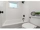 Clean bathroom with subway tile, matte black fixtures, and modern design at 20315 Mid Ct, Lutz, FL 33558
