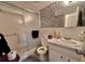 An updated bathroom with walk-in shower, modern fixtures, and a large mirror; great use of space at 2370 Jamaican St # 46, Clearwater, FL 33763