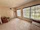 Inviting living room featuring lots of natural light, neutral carpet and comfortable seating at 2370 Jamaican St # 46, Clearwater, FL 33763