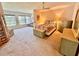 A spacious main bedroom with plenty of light, a ceiling fan, and room for a seating area at 2370 Jamaican St # 46, Clearwater, FL 33763