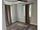 Inviting bedroom featuring wood-look floors and a window allowing ample natural light at 2460 16Th N Ave, St Petersburg, FL 33713