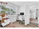 Inviting office with a large window, modern desk, and fun decor, creating a cozy workspace at 2460 16Th N Ave, St Petersburg, FL 33713