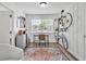 Functional office space with a gray desk and a bike rack, perfect for the active homeowner at 2460 16Th N Ave, St Petersburg, FL 33713