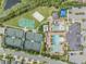 A top-down view shows well-maintained tennis courts, a basketball court, and community pool area at 2468 Coco Palm Cir, Wesley Chapel, FL 33543
