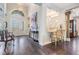 Elegant foyer with high ceilings, stylish decor, and beautiful flooring at 2468 Coco Palm Cir, Wesley Chapel, FL 33543