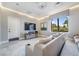 Enjoy movies in a theater-like media room featuring a large screen and comfortable seating with outdoor view at 2468 Coco Palm Cir, Wesley Chapel, FL 33543