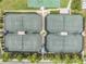 Overhead view of pristine tennis courts, offering a recreational space for residents at 2468 Coco Palm Cir, Wesley Chapel, FL 33543