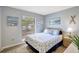 Relaxing bedroom with bright light and beach-themed decor at 2700 Bayshore Blvd # 4204, Dunedin, FL 34698
