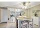 Dining Area includes a pub table with wine rack in the base and mirrored wall in the background at 2700 Bayshore Blvd # 4204, Dunedin, FL 34698