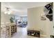 Warm and inviting condo entryway with a dining area and a view into the cozy living room at 2700 Bayshore Blvd # 4204, Dunedin, FL 34698