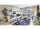 Cozy living room featuring a comfortable seating arrangement and stylish decor at 2700 Bayshore Blvd # 4204, Dunedin, FL 34698