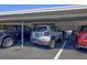 Covered parking spot featuring assigned parking with multiple car options and ample space at 2700 Bayshore Blvd # 4204, Dunedin, FL 34698