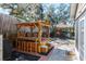 Backyard with hot tub, gazebo, bar seating, and tiki hut perfect for entertaining and relaxing at 275 S Highland Ave, Tarpon Springs, FL 34689