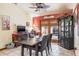 The open dining area features tile floors and a backyard view at 275 S Highland Ave, Tarpon Springs, FL 34689