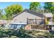 Above-ground pool with a wood deck and fencing, ideal for summer fun with backyard access at 275 S Highland Ave, Tarpon Springs, FL 34689