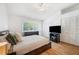 Bedroom features include a ceiling fan, two closets, and a large window at 297 Countryside Key Blvd, Oldsmar, FL 34677