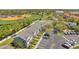 Charming townhomes with designated parking and well-manicured landscaping, adjacent to recreational fields and serene surroundings at 297 Countryside Key Blvd, Oldsmar, FL 34677