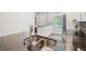 Bright kitchen with granite countertops and stainless steel appliances, with an island at 297 Countryside Key Blvd, Oldsmar, FL 34677