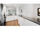 Well-lit kitchen equipped with stainless appliances, granite counters, and abundant storage at 297 Countryside Key Blvd, Oldsmar, FL 34677