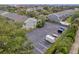 Aerial view of the parking lot with ample parking, surrounded by lush greenery and well-maintained residential buildings at 297 Countryside Key Blvd, Oldsmar, FL 34677