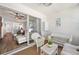 Enclosed patio with view into home's kitchen, dining and living spaces at 297 Countryside Key Blvd, Oldsmar, FL 34677