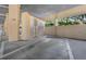 Assigned covered parking space with storage room in a residential building at 3076 Eastland Blvd # 305, Clearwater, FL 33761