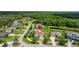 Aerial view of home with pool and spacious backyard nestled in a lush, green neighborhood at 3226 Cordoba Ranch Blvd, Lutz, FL 33559