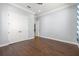 Light, bright bedroom boasts hardwood floors and a spacious closet for ample storage at 3226 Cordoba Ranch Blvd, Lutz, FL 33559
