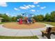 Community playground with colorful play structures and a shaded canopy at 3226 Cordoba Ranch Blvd, Lutz, FL 33559
