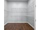 Empty walk-in closet featuring wire shelving, and hardwood floors at 3226 Cordoba Ranch Blvd, Lutz, FL 33559